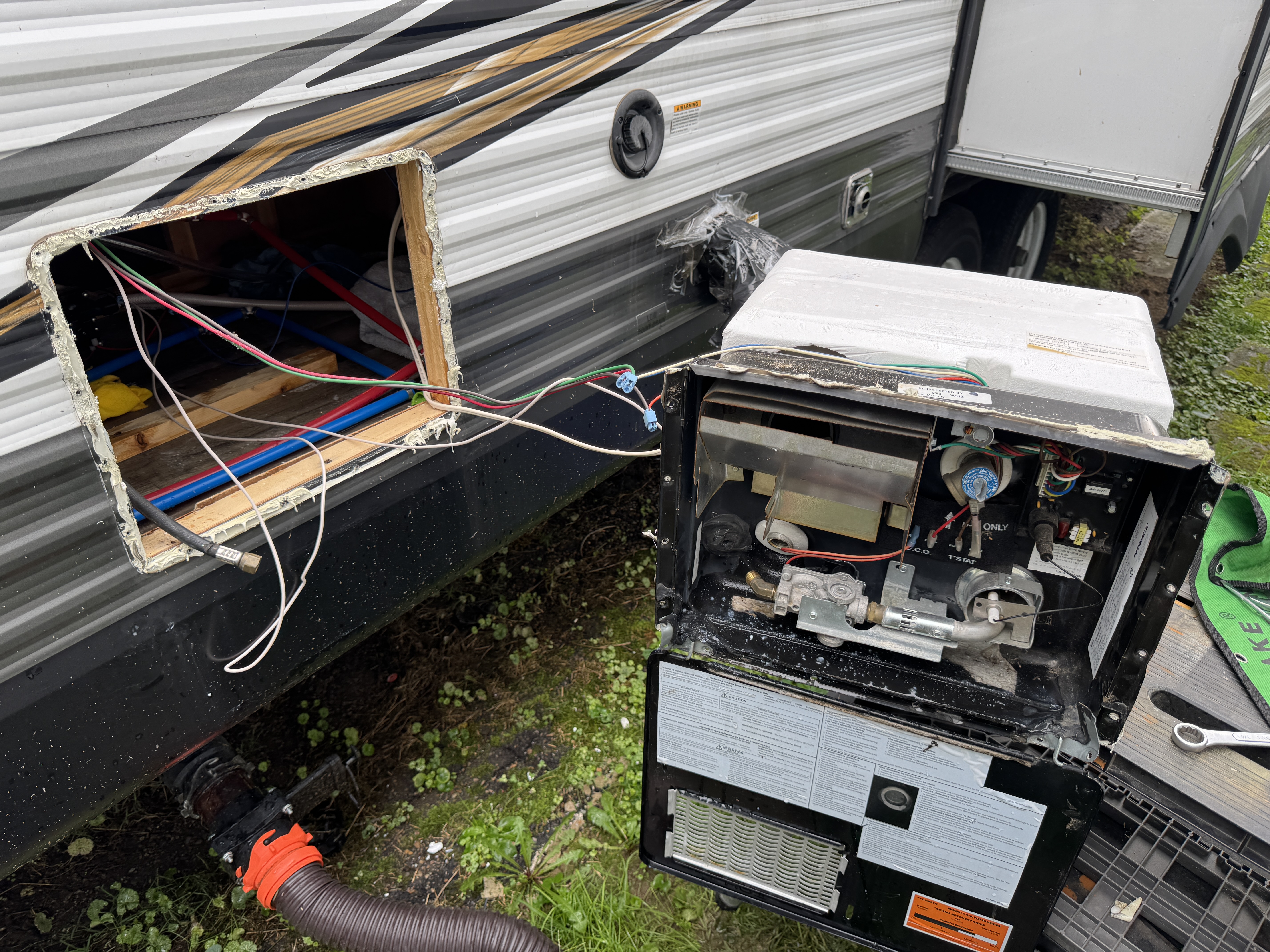 Water heater repair photo 2 on Jayco Jay Flight travel trailer in Bristol, Tennessee